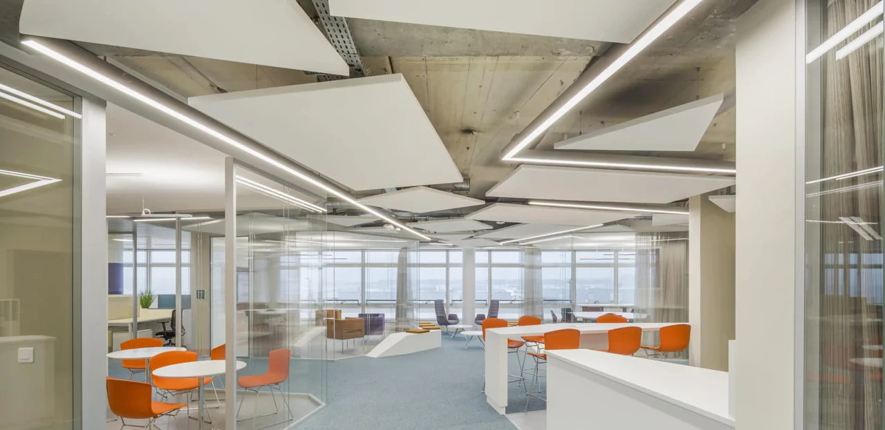 Linear lighting above a contemporary workspace