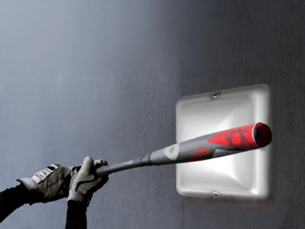 Impact resistance demonstration on a wall-mounted luminaire