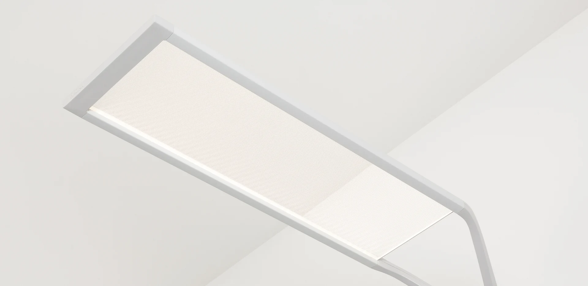 Trema freestanding luminaire with a rectangular light head